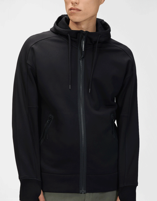 Ce sweatshirt CP Company à capuche pour homme présente une fermeture zippée sur toute la longueur.