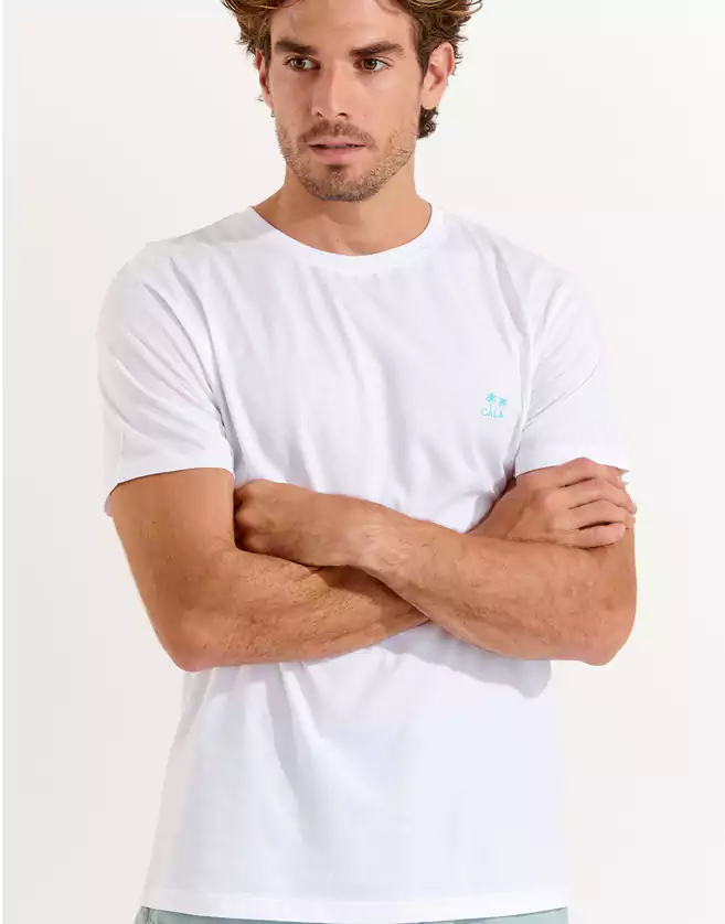 T-shirt Cala blanc YANNPALMCOLOR GALLIANI. Le t-shirt blanc est la pièce intemporelle et indispensable d'une garde-robe.