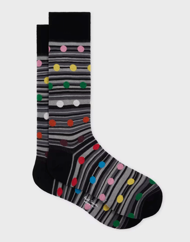 Ces chaussettes Paul Smith fabriquées en Italie à partir d'un mélange de coton arborent un design à rayures ton sur ton avec un motif à pois multicolores superposé.