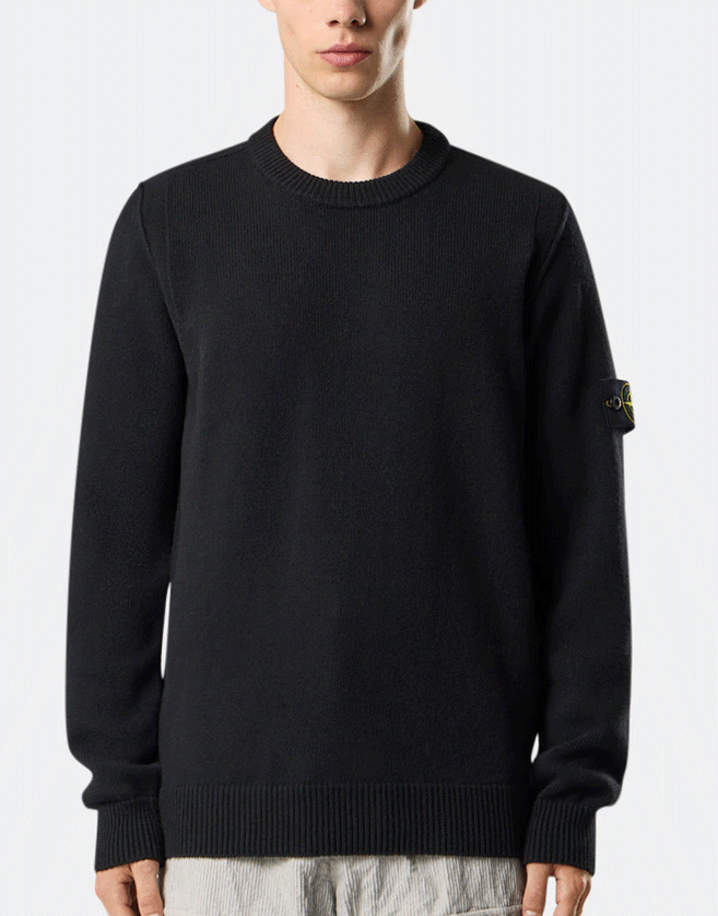 Pull Stone Island ras-du-cou avec détails en maille envers. finitions côtelées. Jauge 7.